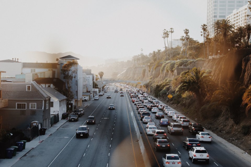 Heavy traffic on a California highway, illustrating how car insurance rates vary by state across the USA