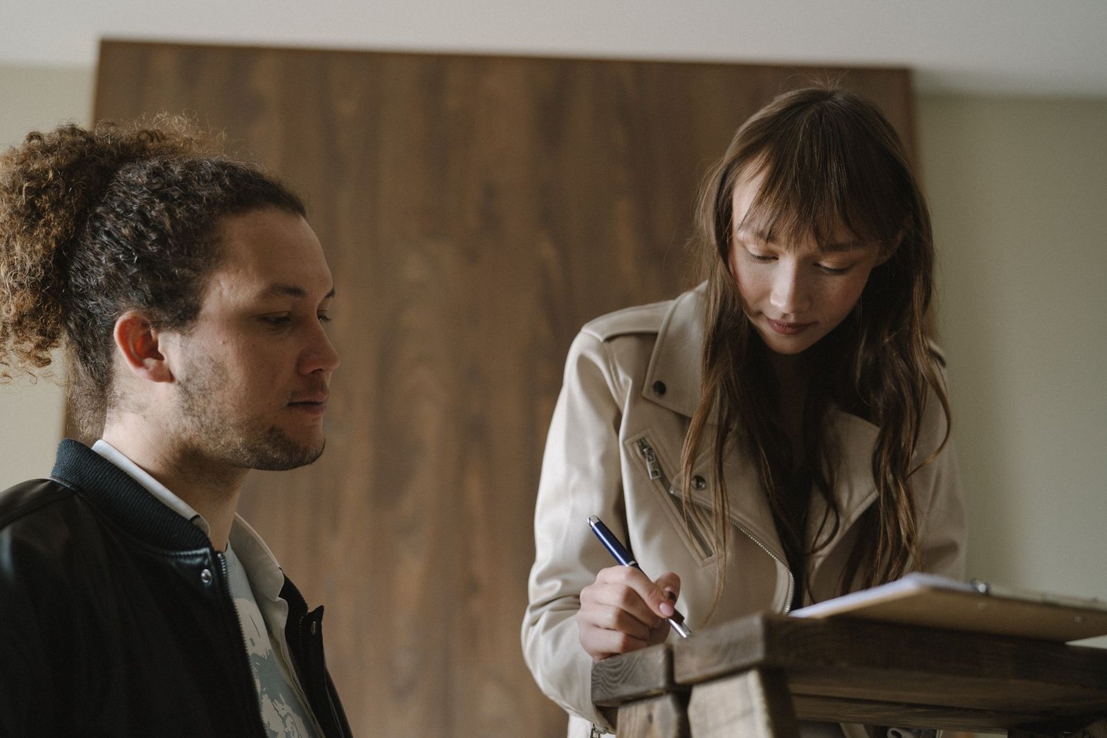 Signing a rental lease that requires renters insurance with the landlord as additional interest