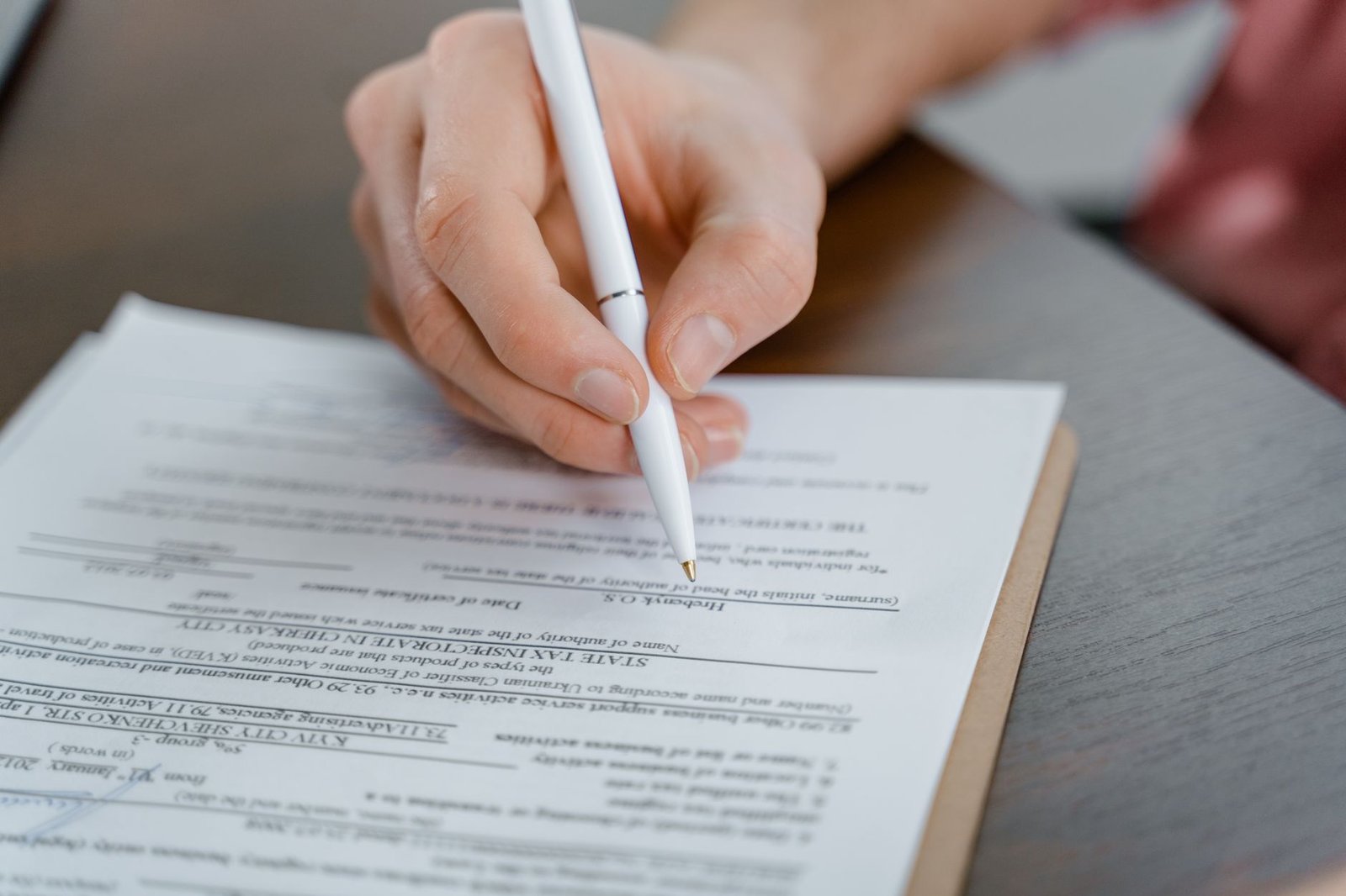 Signing a life insurance policy, where the conversion privilege and riders matter most
