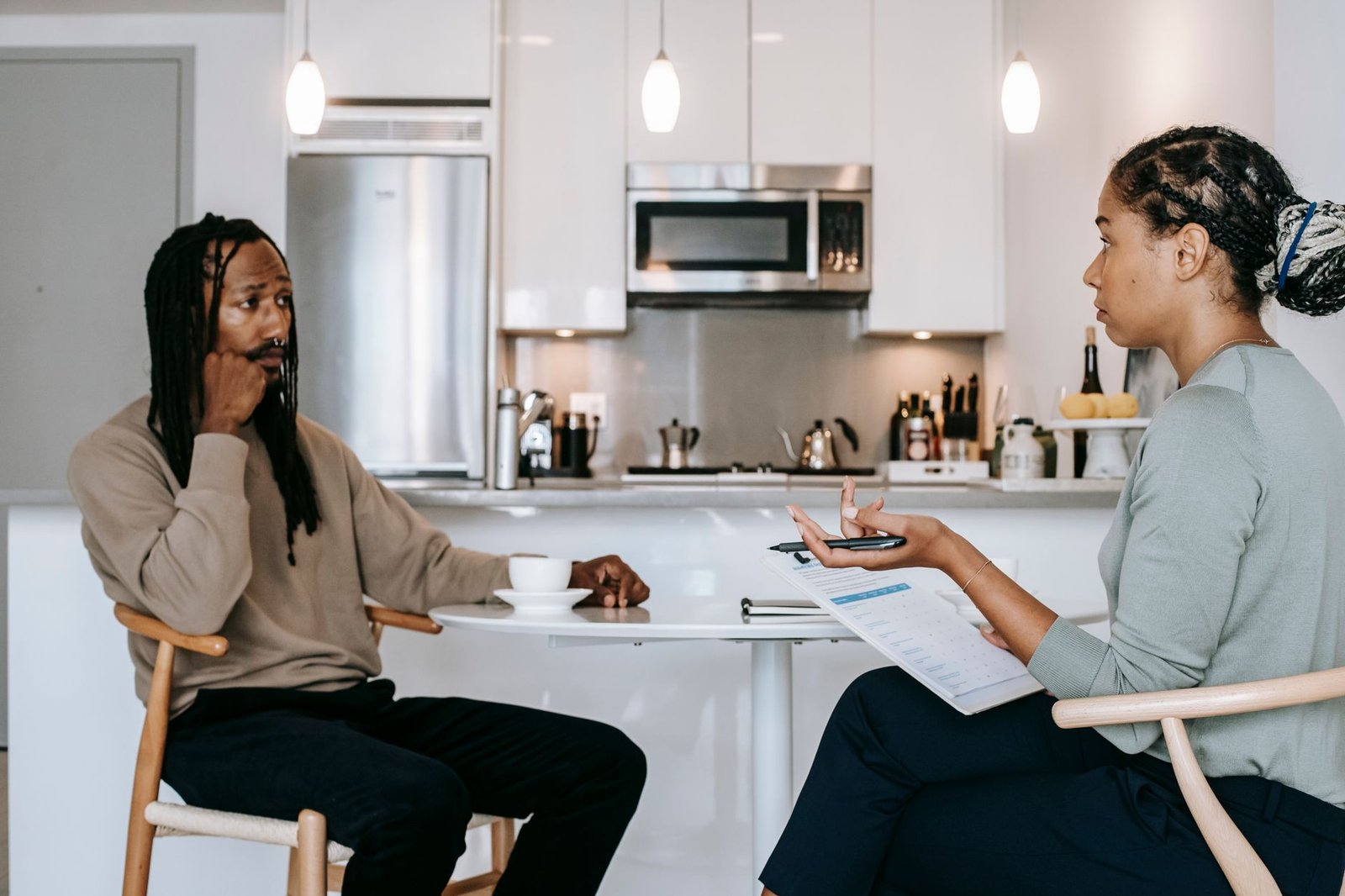 Meeting a non-profit credit counsellor to discuss a debt management plan
