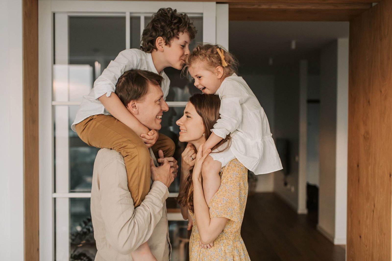 Family at home, illustrating why term vs whole life insurance depends on how long your dependents need support